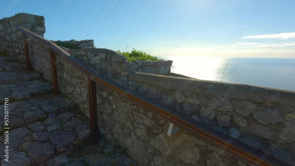 Touristic Town on Capri Island, Bay of Naples, Italy. Sunny Blue Sky. Nature Background. View from top of Mountain. Slow Motion Cinematic Touristic Town on Capri Island, Bay of Naples, Italy. Sunny Blue Sky. Nature Background. View from top of Mountain. Slow Motion Cinematic