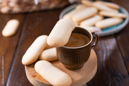 Cookies cat's tongue. Traditional Indonesian and Italian biscuit pastries. Dessert and espresso coffee