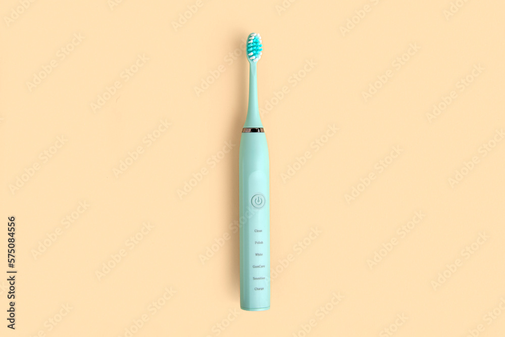 Electric Toothbrush. Top View, Flat Lay, Copy Space. Dental Care Supplies on Beige Pastel Studio Background. Oral Hygiene, Gum Health, Healthy Teeth. Modern Dental Ultrasonic Vibration Tooth Brush Set Electric Toothbrush. Top View, Flat Lay, Copy Space. Dental Care Supplies on Beige Pastel Studio Background. Oral Hygiene, Gum Health, Healthy Teeth. Modern Dental Ultrasonic Vibration Tooth Brush Set