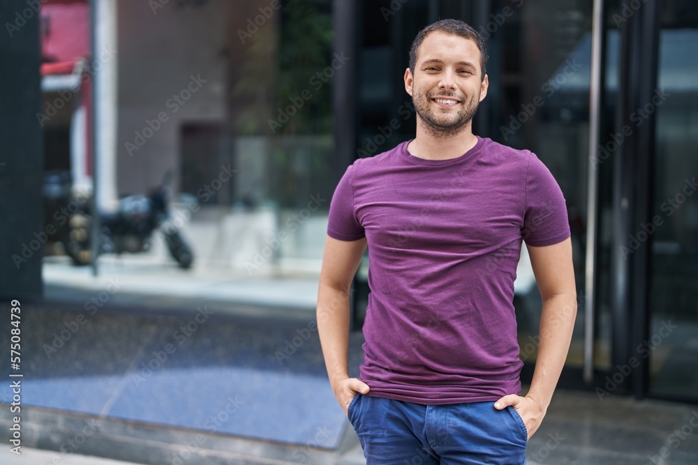 Young man smiling confident standing at street Young man smiling confident standing at street