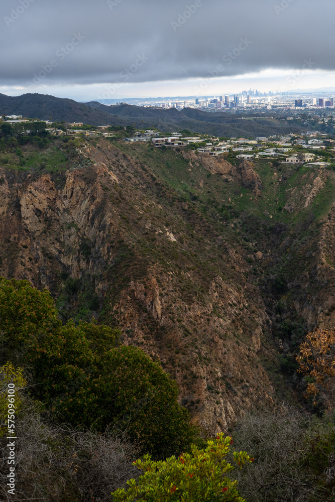 Naklejka premium Sunset views from the Santa Monica Mountains while hiking, looking down on the city of Los Angeles and the Santa Monica Bay.