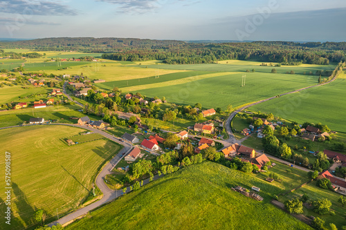 village Cervena Tremsesna in Eastern Bohemia from above during evening sun