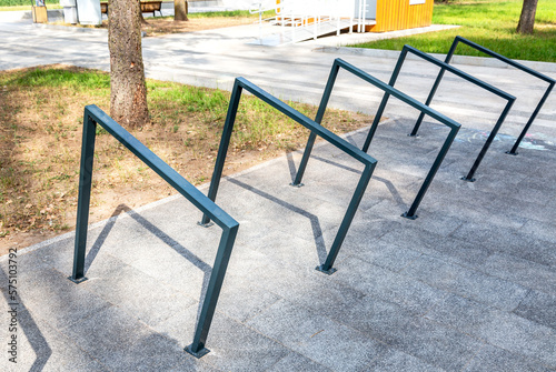 Metal parking lot for bicycles on the city street