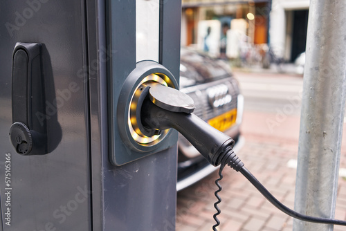 Electric car charging at street