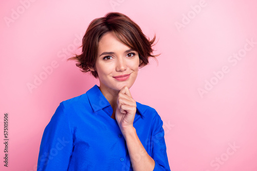 Portrait of lovely positive lady hand touch chin brainstorming empty space isolated on pink color background