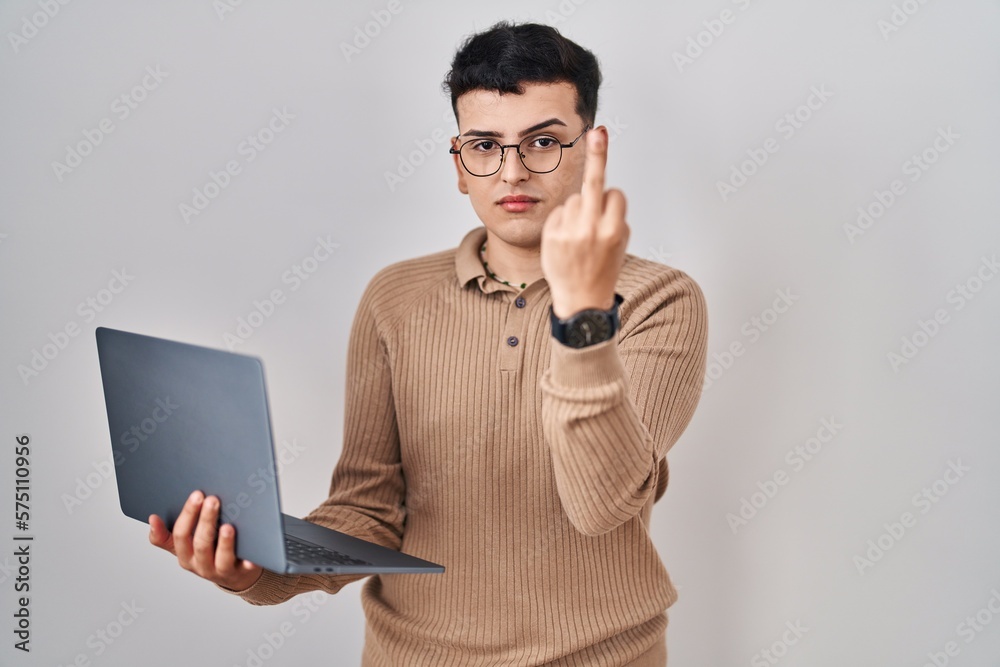 Rude Computer Non binary person using computer laptop showing middle finger, impolite ...