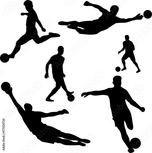 silhouette of soccer player kicking and catching ball