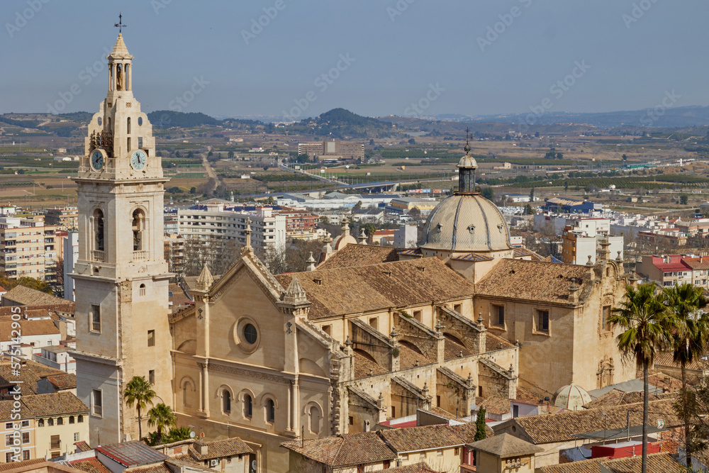 Top view of the old European city with tiled roofs and a large church