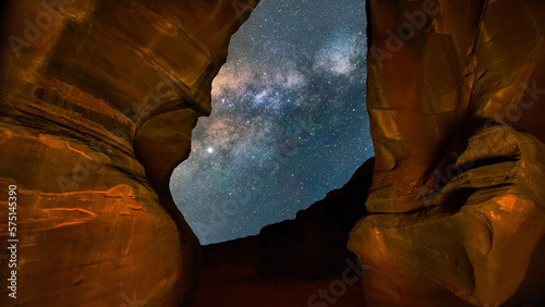 The rock formations of Antelope Canyon under a stunning evening sky with many stars in Page, Arizona, USA.