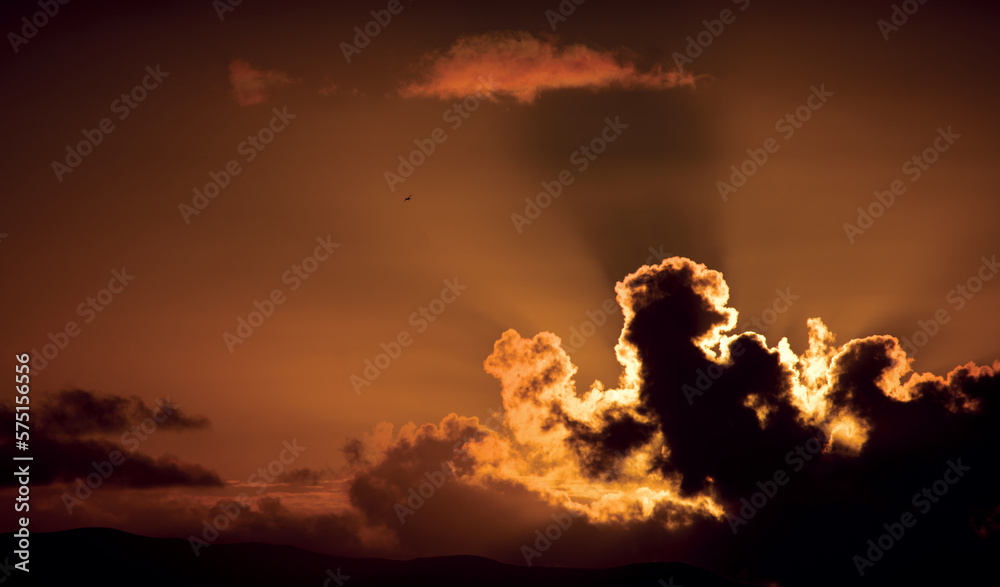 Naklejka premium storm clouds at sunset