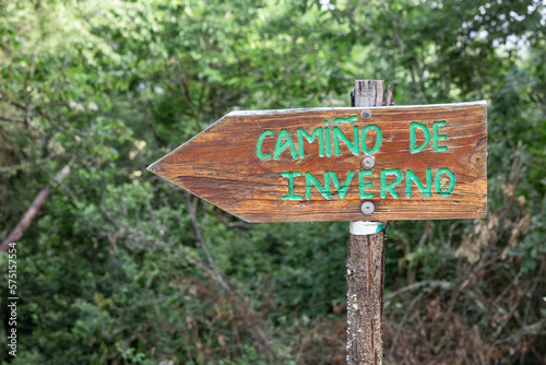 Camiño de Inverno (Winter Way) - wooden signpost in Galicia showing the way to Santiago de Compostela, Spain