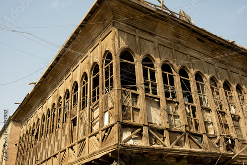 Basrah, iraq - February 15, 2023: photo of balconies and windows of  historic houses in basra city