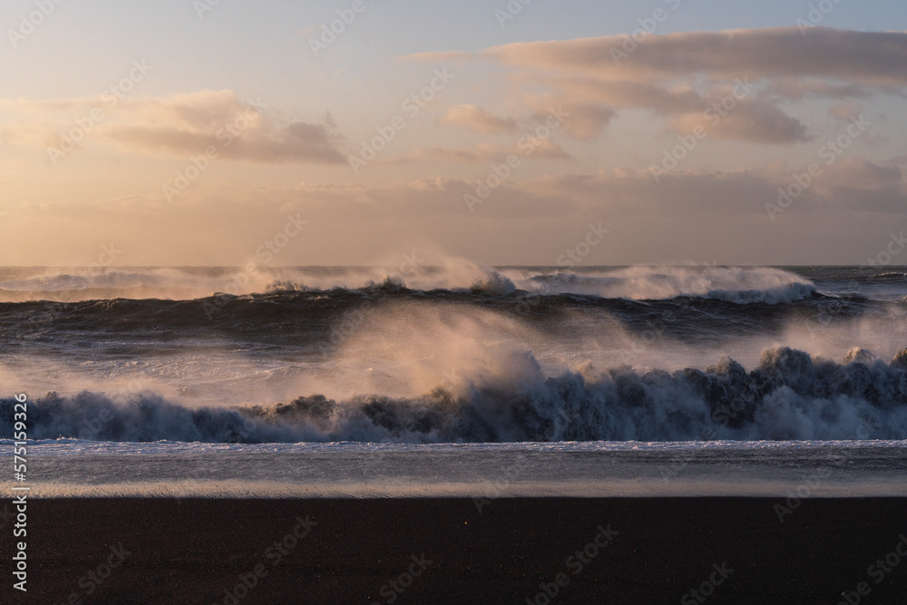 Fototapeta premium Black beach Iceland big ocean waves during sunrise