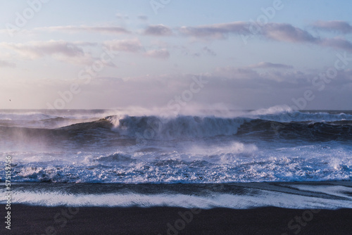 Big ocean waves during sunrise waves during sunset