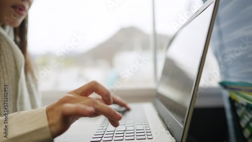 4K Asian woman freelance work on laptop computer during travel on railway transportation. Businesswoman working online corporate business outside office. Work from anywhere and digital nomad concept.