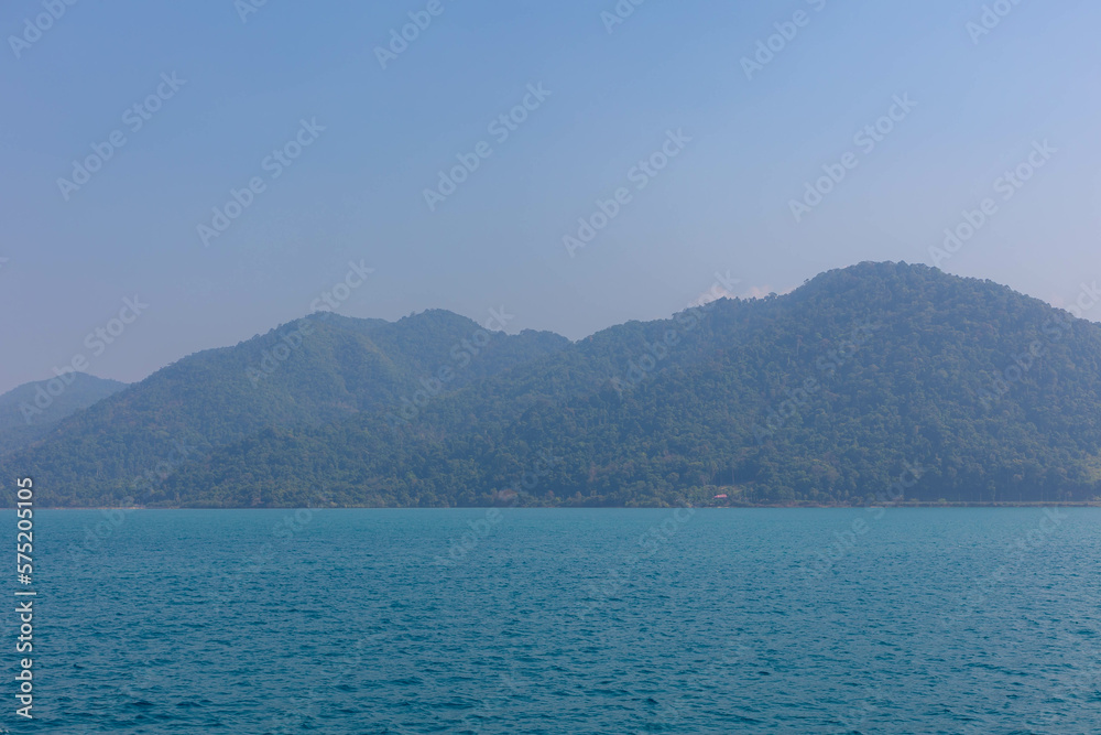 Arrival of Koh Chang, Landscape view of blue sea and high mountains and forest, One of the largest Thai islands in the Gulf of Thailand, Contains dense steep jungle, Mu Ko Chang National Park, Trat.