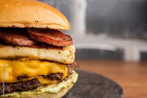 Burger - Sandwich with beef burger, mozzarella cheese, curd cheese, pepperoni sausage and mayonnaise