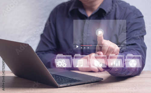 concept of online learning on-demand course. Man learning various fields of knowledge through online lessons, music, agriculture, industry, stocks, machinery.
