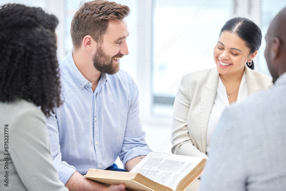 Obraz premium Business people, bible reading and office together with worship, religion and happiness for spiritual education. Businessman, women and men with book, studying and support for solidarity in workplace