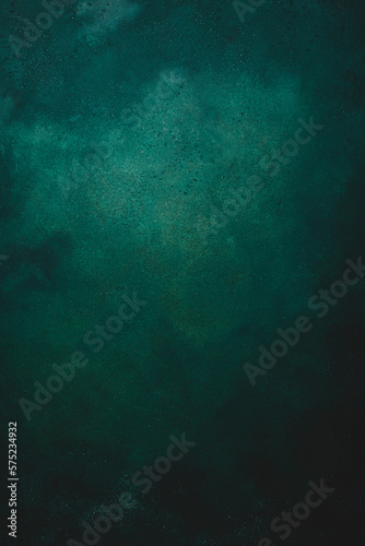 Matte green texture or background with stains, waves and grain elements. Image with place for text. Template for design