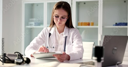 Wallpaper Mural Cardiologist examines cardiogram of heart closeup Torontodigital.ca