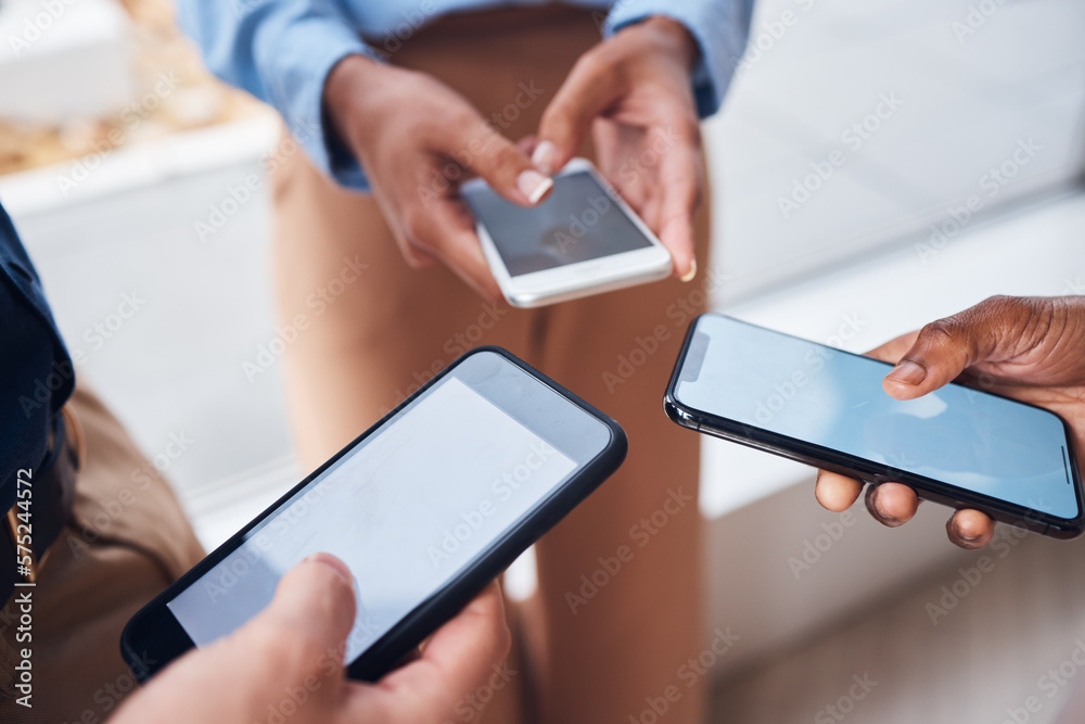 Business people, hands and phone with mockup screen for advertising, marketing or networking at office. Hand of group on mobile smartphone display for social media, app or data share in communication Business people, hands and phone with mockup screen for advertising, marketing or networking at office. Hand of group on mobile smartphone display for social media, app or data share in communication