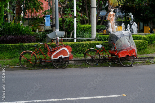 Beautiful Indonesian Traditional Pedicab/Becak. This is a good tourism transportation in Surakarta City, Indonesia photo