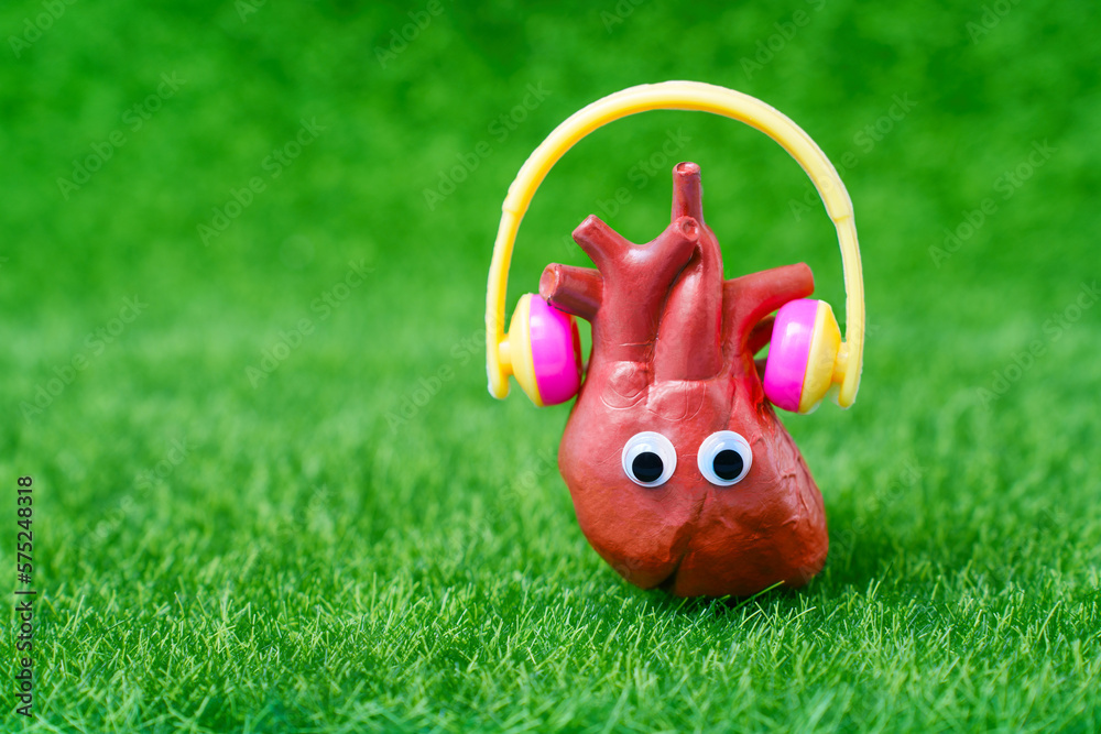 Happy Heart Character Listening to Music with Headphones - obrazy, fototapety, plakaty 