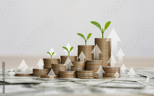 stack of silver coins with the chart in Passive income financial concept and financial investment business stock growth. finance freedom concept.