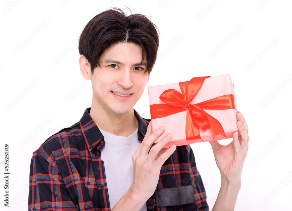 Young man holding gift box on valentine day Young man holding gift box on valentine day