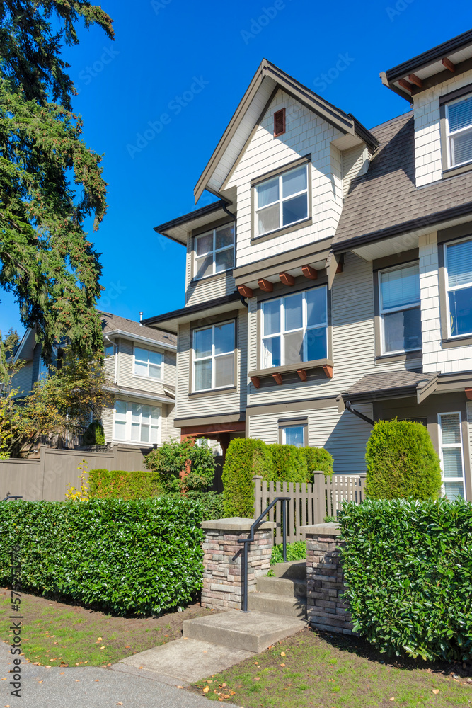 Paved pathway to the entrance of residential townhouse