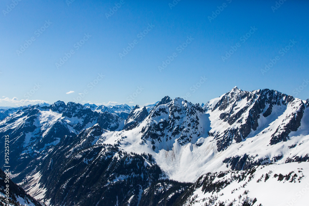 Snow-covered mountain range, North Cascades National Park, Washington State, USA Snow-covered mountain range, North Cascades National Park, Washington State, USA