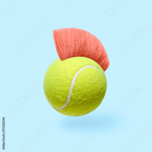 Bild auf Leinwand Humor pop art fun tennis ball with a pink mohawk hairstyle