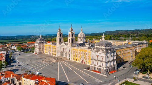 Aerial view of the Palace of Mafra. Unesco world heritage in Portugal. Aerial top view of the Royal Convent and Palace of Mafra, baroque and neoclassical palace. Drone view of a historic castle. photo