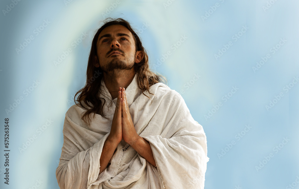 Man praying who looks like holy Jesus created using generative AI