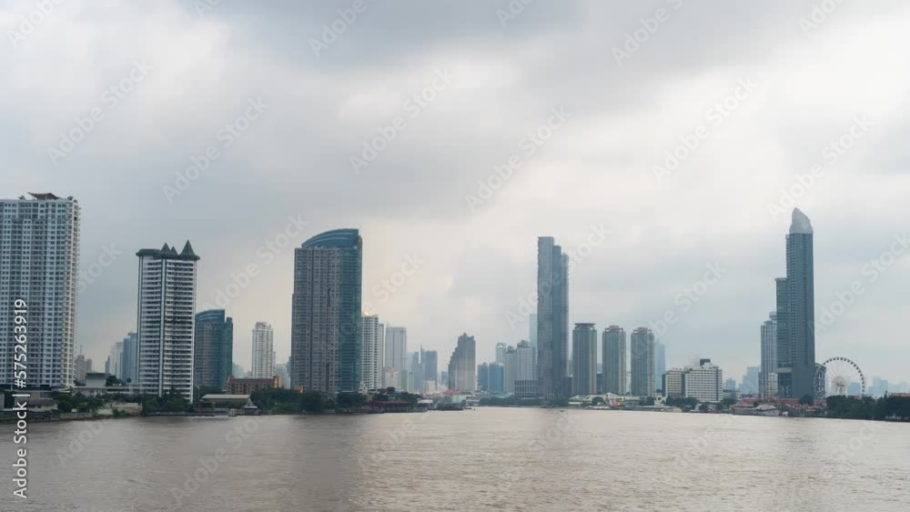 View of tall buildings at Chao Phraya River Bangkok business district, Timelapse view of Bangkok cityscape Thailand View of tall buildings at Chao Phraya River Bangkok business district, Timelapse view of Bangkok cityscape Thailand