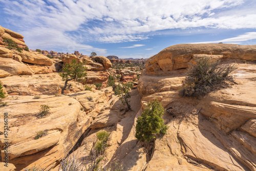 hiking the chesler park loop trail in the needles in canyonlands national park, usa