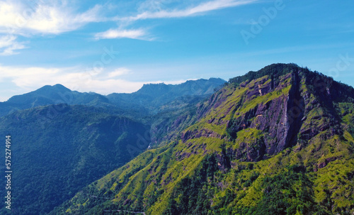 Aerial view of the mountain gorge and hills. Beautiful rock background texture for tourism and advertising. Tropical landscape from a drone