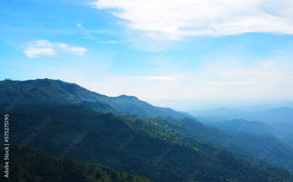 Aerial view of the mountain gorge and hills. Beautiful rock background texture for tourism and advertising. Tropical landscape from a drone Aerial view of the mountain gorge and hills. Beautiful rock background texture for tourism and advertising. Tropical landscape from a drone
