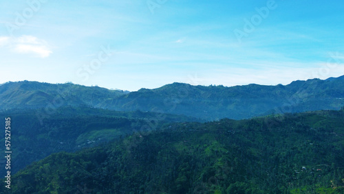 Aerial view of the mountain gorge and hills. Beautiful rock background texture for tourism and advertising. Tropical landscape from a drone