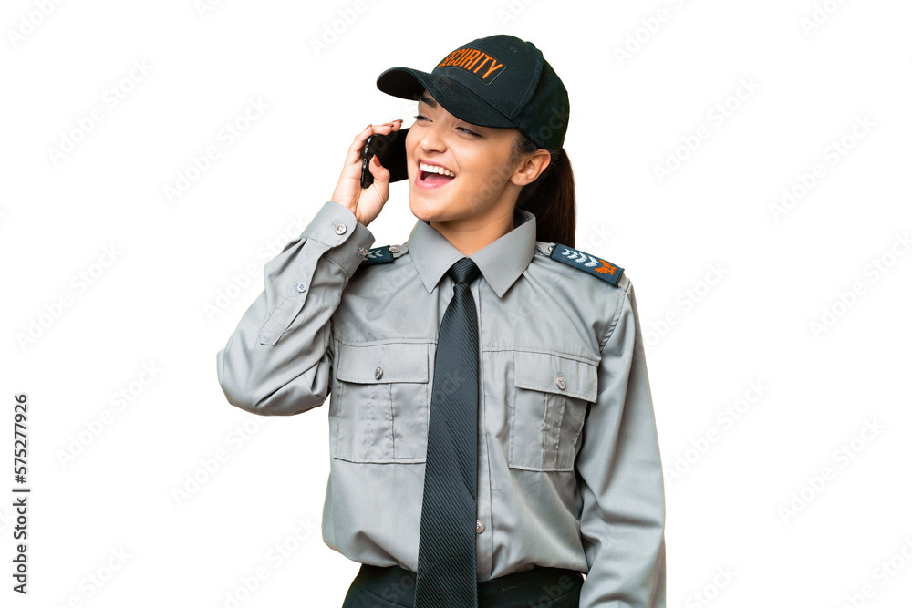 Young safeguard woman over isolated chroma key background keeping a conversation with the mobile phone Young safeguard woman over isolated chroma key background keeping a conversation with the mobile phone