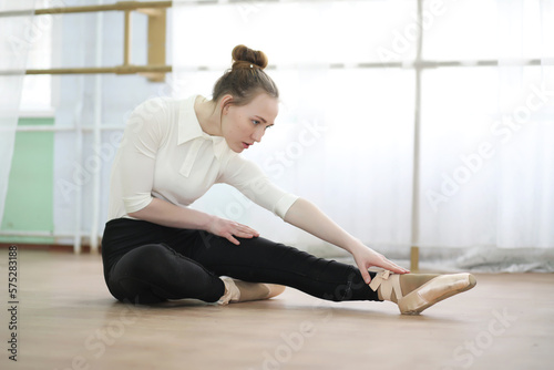 Pretty girl ballet dancer practicing