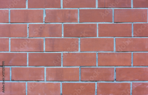 Red brick wall with cement mortar
