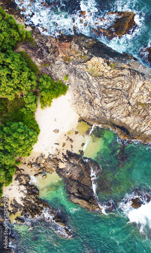 Aerial view of the sea rocks cliffs in the ocean. Beautiful sea wallpaper for tourism and advertising. Stormy landscape  drone photo
