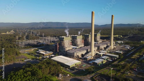 Low aerial drone view of Eraring Power Station, Australia’s largest coal fired power station consisting of steam driven turbo alternators located at Eraring, NSW, Australia photo