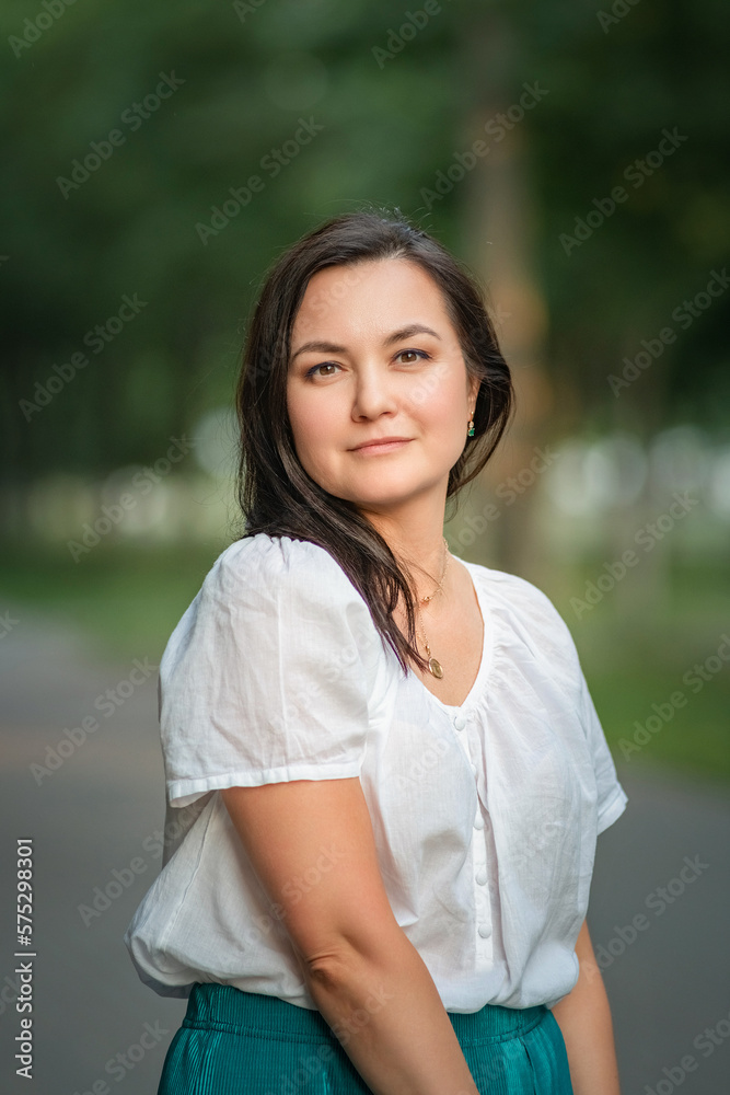 Portrait of a beautiful girl in a summer park. Portrait of a beautiful girl in a summer park.
