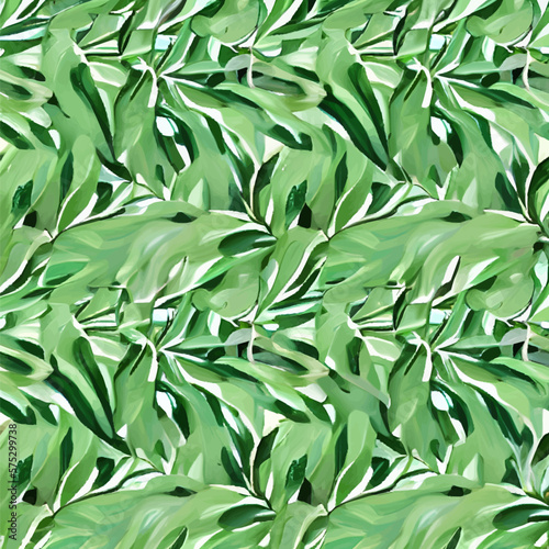 Creative seamless background of green leaves