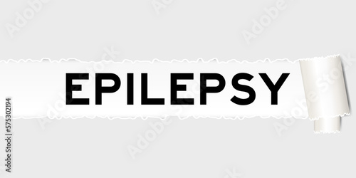 Ripped gray paper background that have word epilepsy under torn part
