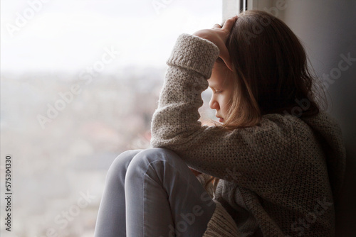Fotografi Stressed Sad Teenager Girl feeling Lonely at Home