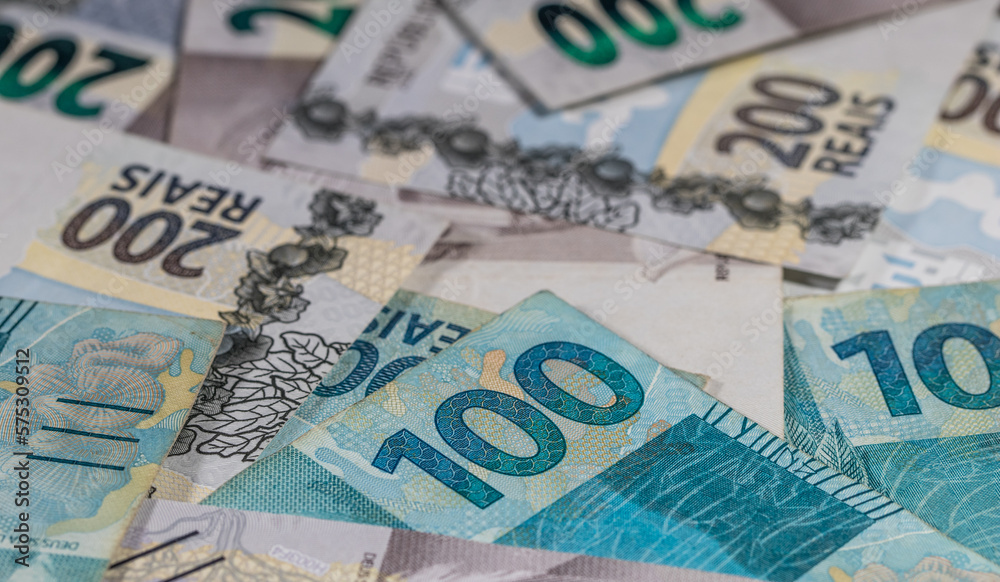 Background and texture with Brazilian Reais banknotes. Background and texture with Brazilian Reais banknotes.